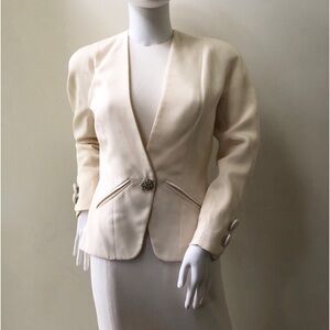 Summer event. Special occasion long dress and tailored jacket with major bling.